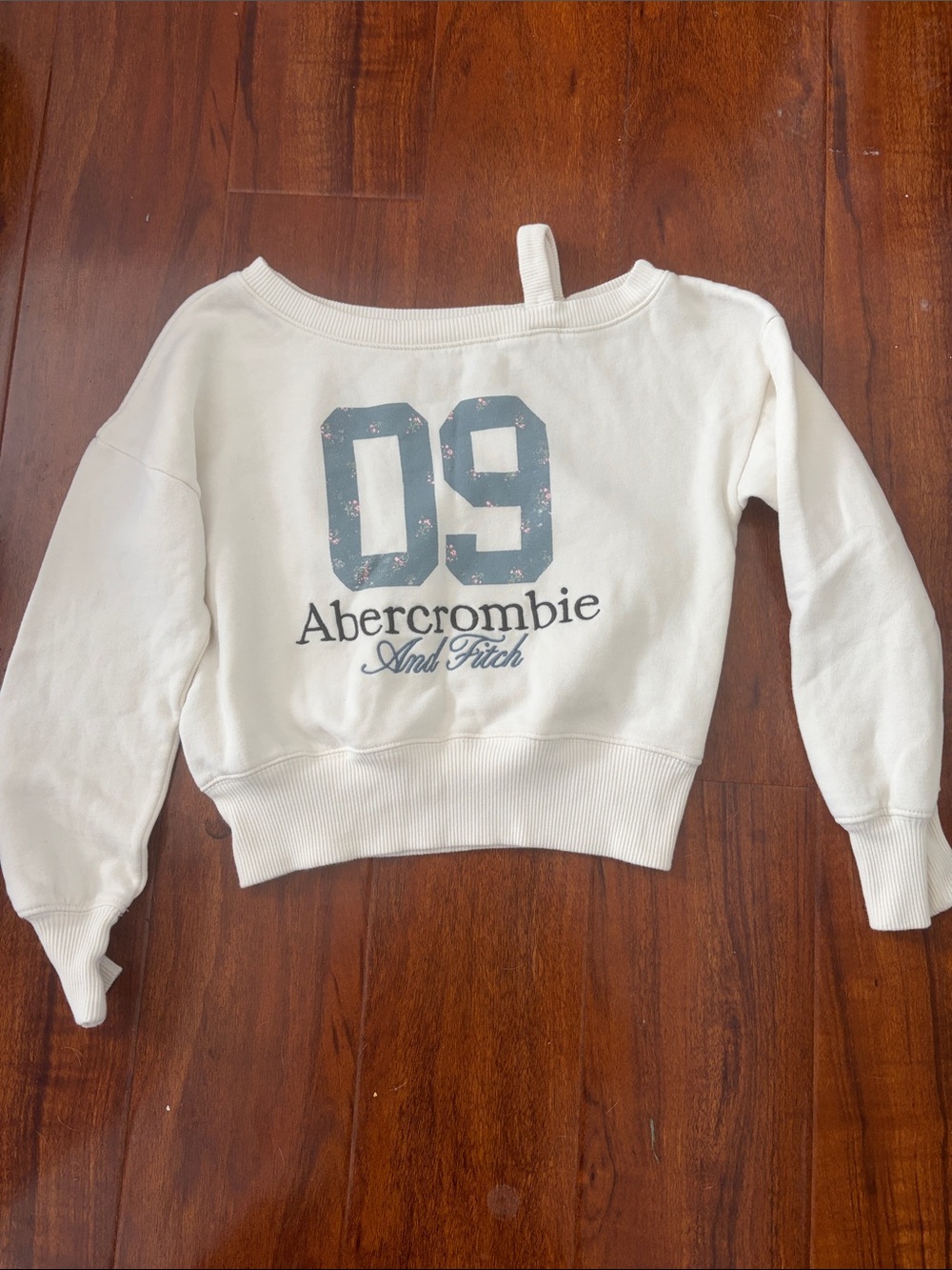 Abercrombie & Fitch Cream Off-Shoulder Sweatshirt with Blue '09' Graphic
